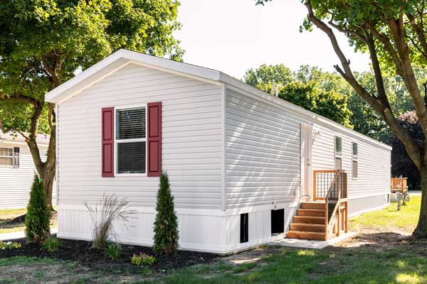 A mobile home that is eligible for mobile home refinancing with a better rate.