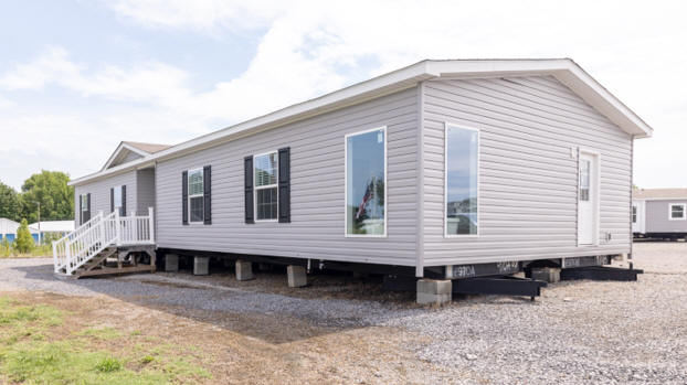 A gray manufactured home ready for a buyer
