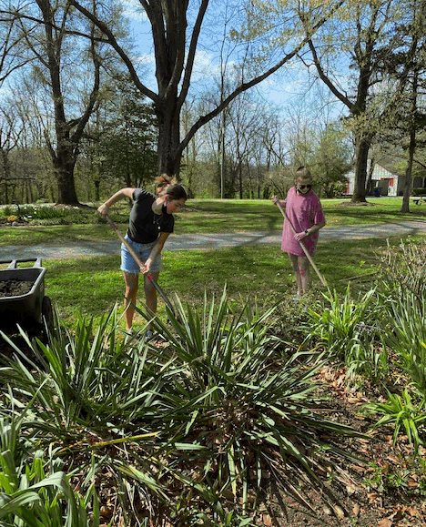 21st Mortgage team members gardening