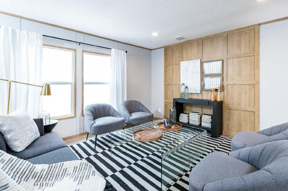 A remodeled modern living room in a  manufactured home
